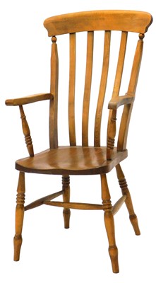 Lot 974 - A beech lath back open armchair, on turned...