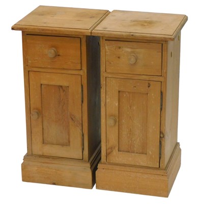 Lot 998 - A pair of narrow pine bedside chests, each...