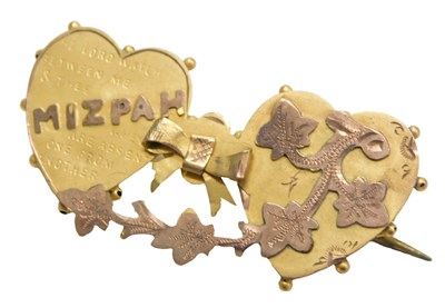 Lot 775 - A Victorian two coloured Mizpah double heart...