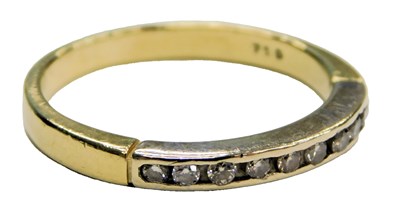 Lot 532 - A diamond half hoop eternity ring, set with...