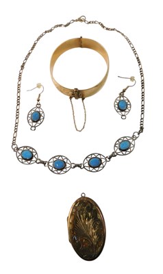 Lot 611 - A 9ct gold plated bangle, with engraved...