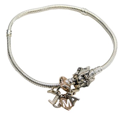 Lot 582 - A Pandora bracelet, with a 'Family' charm, on...