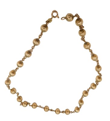 Lot 564 - A 9ct gold ball and oval link necklace, on a...