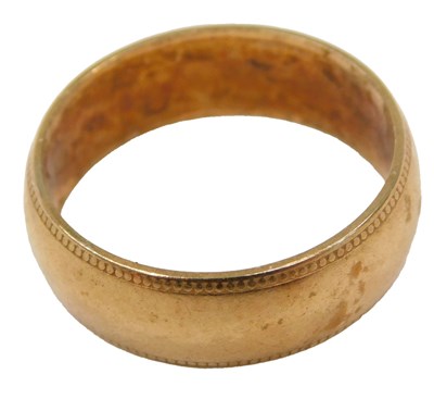 Lot 591 - A 9ct gold wedding band, size M, 3.7g.