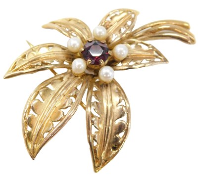 Lot 590 - A 9ct gold garnet and seed pearl brooch, in a...