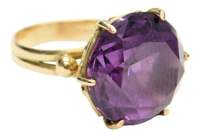 Lot 619 - An amethyst ring, the circular cut amethyst in...