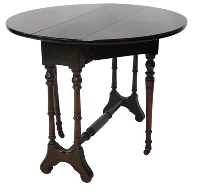 Lot 1079 - A walnut Sutherland table, with oval drop leaf...