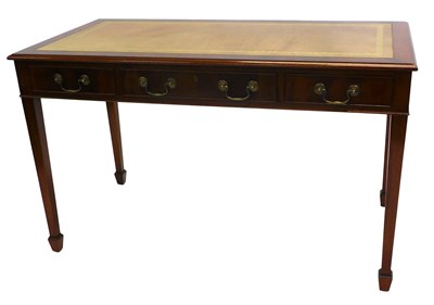 Lot 1004 - A Martin J Dodge mahogany writing table, in...