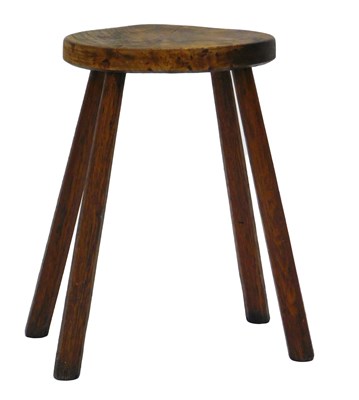 Lot 1005 - A 19thC rustic stool, with oval top, on...