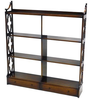 Lot 1011 - A mahogany wall shelf, in Chippendale style,...