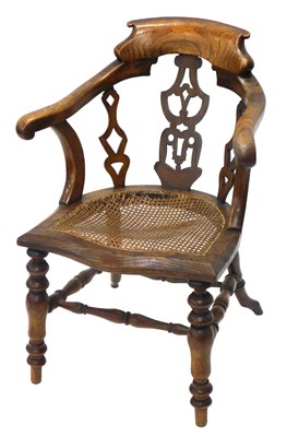 Lot 1019 - A 19thC elm captain's type chair, with a...