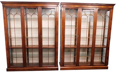 Lot 1029 - A pair of mahogany display cabinets, in George...