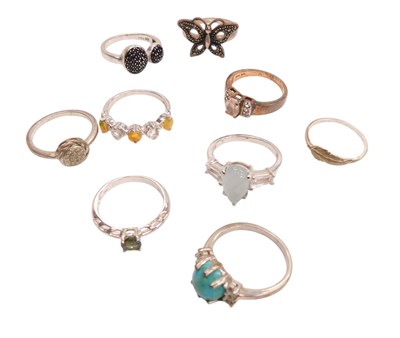 Lot 748 - Assorted silver and metal rings, some set with...