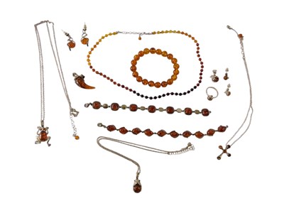 Lot 741 - A group of silver and amber set...
