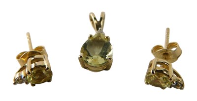 Lot 647 - A citrine pendant, the pear shaped stone, in...