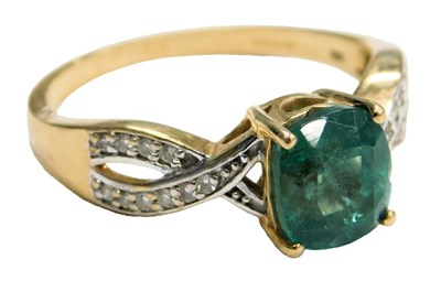 Lot 766 - An 18ct gold emerald and diamond shaped...