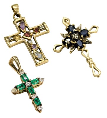 Lot 753 - Three 9ct gold and gem set pendant...