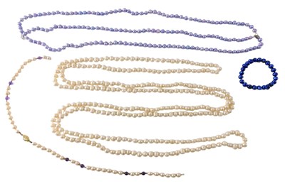 Lot 648 - A long freshwater pearl necklace, freshwater...