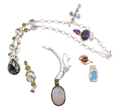 Lot 643 - Silver and gem or paste set pendants, together...