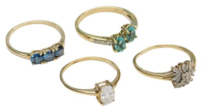 Lot 721 - A 9ct gold and diamond cluster ring, set with...