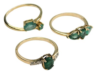 Lot 725 - Three 9ct gold and emerald set rings, one with...