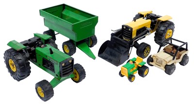 Lot 301 - A green Tonka tractor and trailer, and a Tonka...