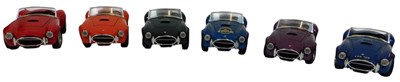 Lot 344 - Burago 1:24 scale diecast cars, including a...