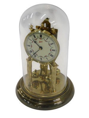 Lot 237 - A Schatz brass anniversary clock, in glass...
