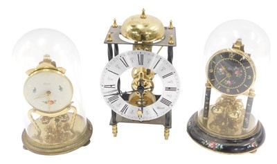Lot 239 - A Hermle metal skeleton clock, with silvered...