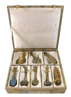 Lot 373 - A set of eight Oriental cloisonne miniature...