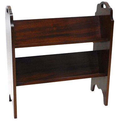 Lot 949 - A mahogany book rack, with two sloping shelves...