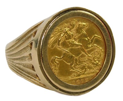 Lot 1 - A George V half gold sovereign, dated 1912, in...