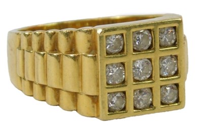 Lot 21 - A gentleman's nine stone diamond ring, each...