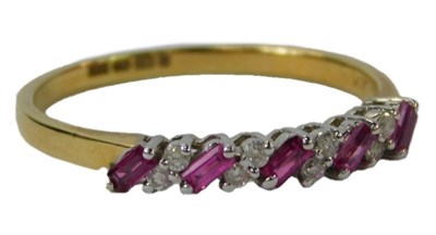 Lot 27 - A 18ct gold ruby and diamond ring, the five...