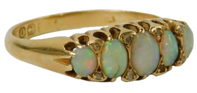 Lot 32 - A Victorian opal five stone ring, the...