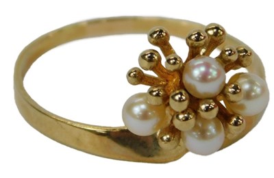 Lot 51 - A 9ct gold and seed pearl abstract cluster...