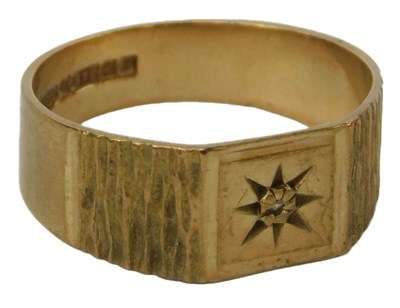 Lot 53 - A 9ct gold ring, with star central decoration...
