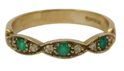 Lot 71 - An emerald and diamond ring, the three...