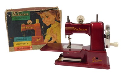 Lot 374 - A Vulcan Senior child's sewing machine, boxed.