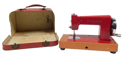 Lot 375 - A Cinzia child's sewing machine, in...