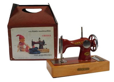 Lot 376 - An Orsha child's sewing machine, in case.