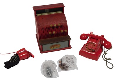 Lot 386 - A Codeg red toy till,  an Eveready duster...