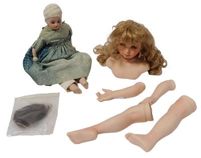 Lot 419 - Ceramic dolls, including a Paul ceramic doll,...