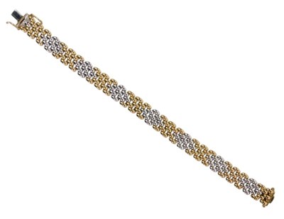 Lot 93 - An Italian bicolour bracelet, with an open box...
