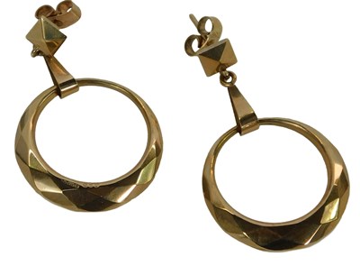 Lot 204 - A pair of 9ct gold earrings, each with a...