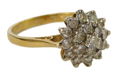 Lot 226 - An 18ct gold and diamond cluster ring, the...