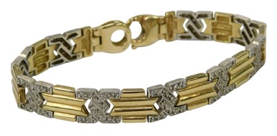 Lot 232 - A 9ct gold and white gold diamond encrusted...