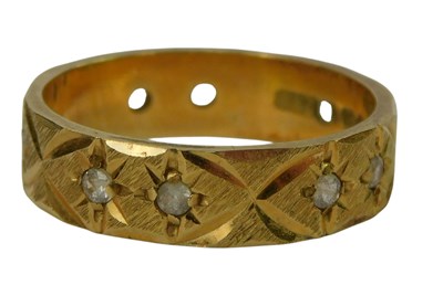 Lot 234 - A 9ct gold and white stone set eternity...