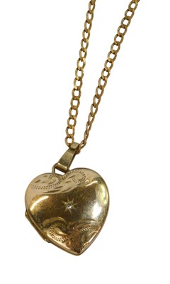 Lot 268 - A heart shaped locket, set with a single...