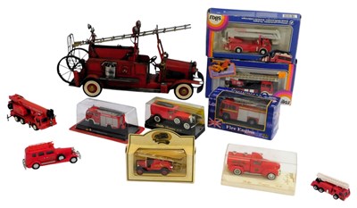 Lot 496 - Various boxed and unboxed diecast fire engines,...